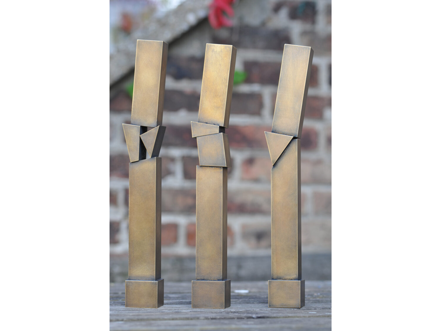 3 sculptures, oxidized brass, h 36 cm, 2009